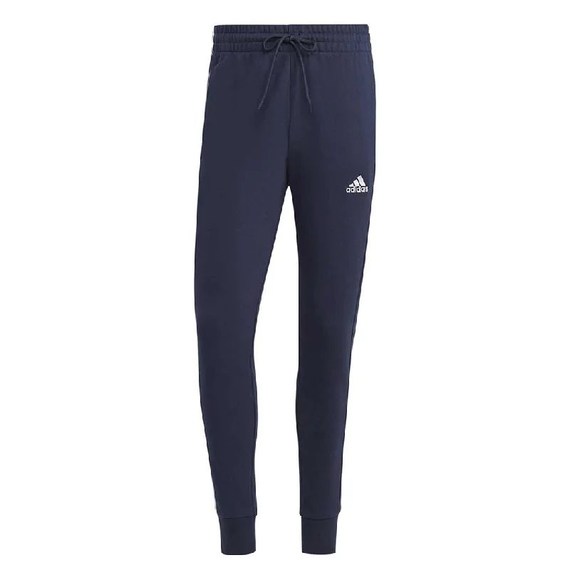 sock styles hiking -  adidas - Men's Essentials French Terry Tapered Cuff 3 Stripes Pants (IC9406)